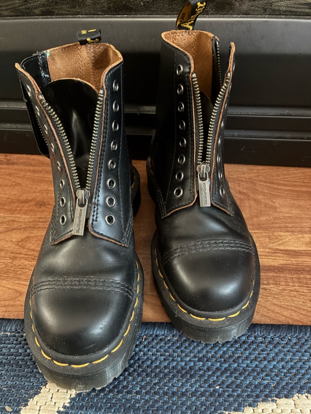Dr. Martens Black Leather Front-Zip Platform Boots with Yellow Stitching